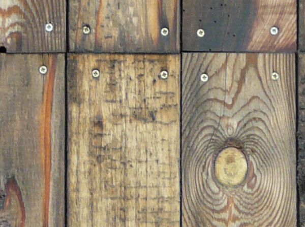 Rustic planks in varying widths and different surface colors and patterns.